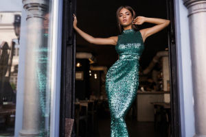 woman wearing green sequin gown