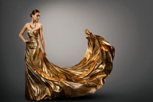 woman strapless gold mermaid dress