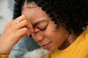 Woman experiencing sinus pain
