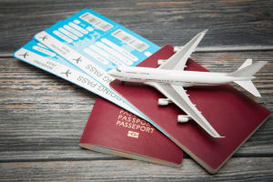 Toy plane, tickets, and passport Travel concept