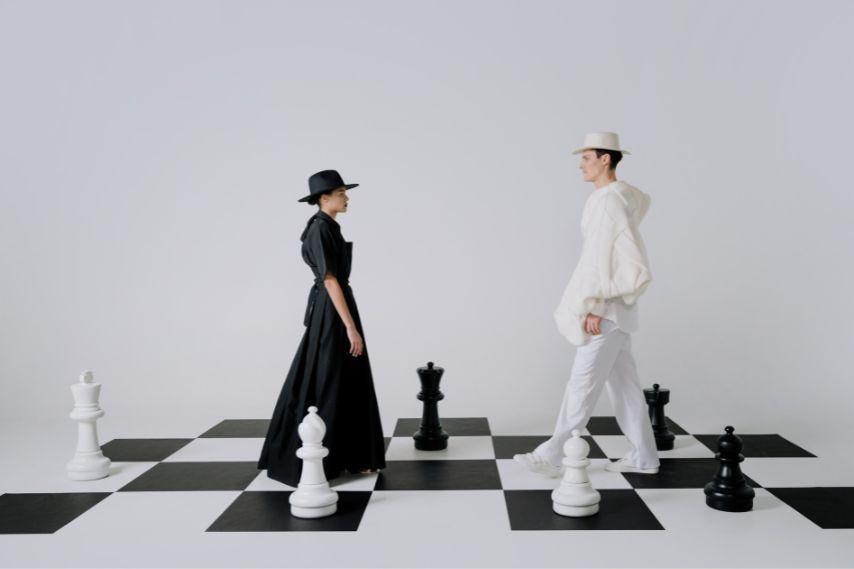 designer clothing man and woman black and white chessboard