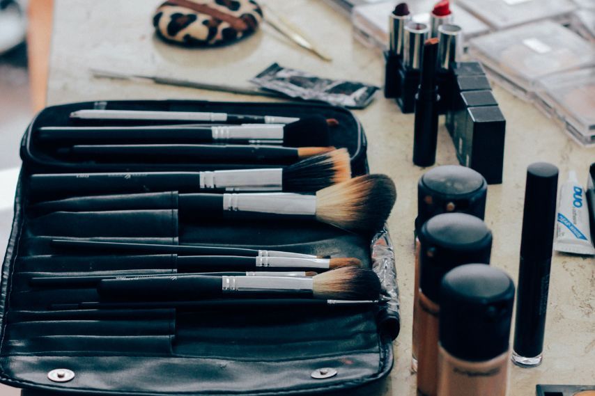 black makeup brush cosmetic bag and make up