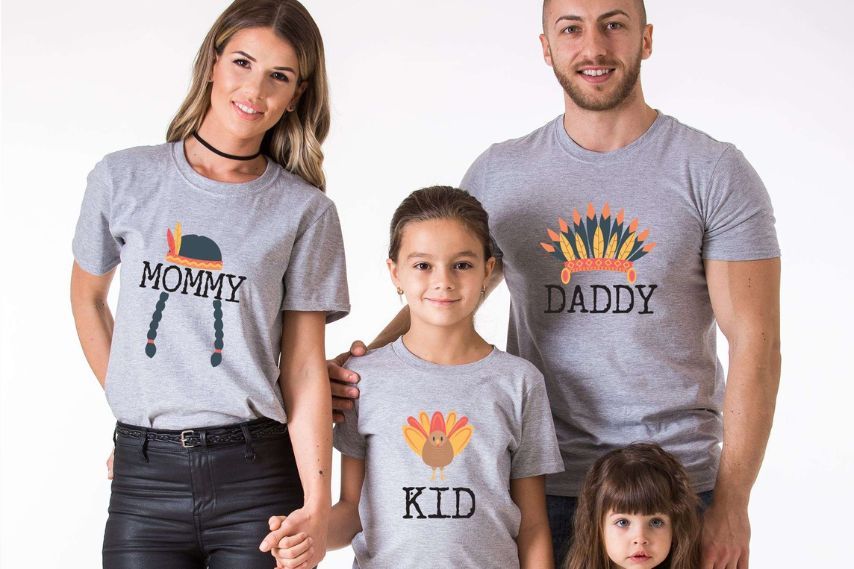 family wearing gray coordinating Thanksgiving tshirts