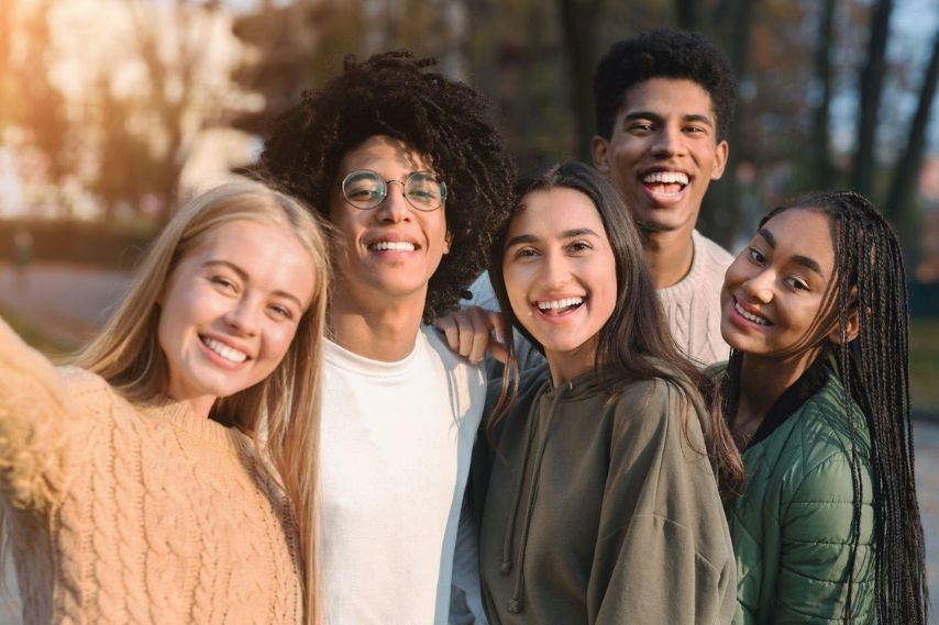 group of smiling teens