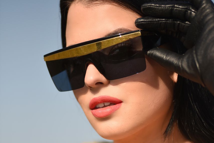 Woman wearing oversized shield sunglasses