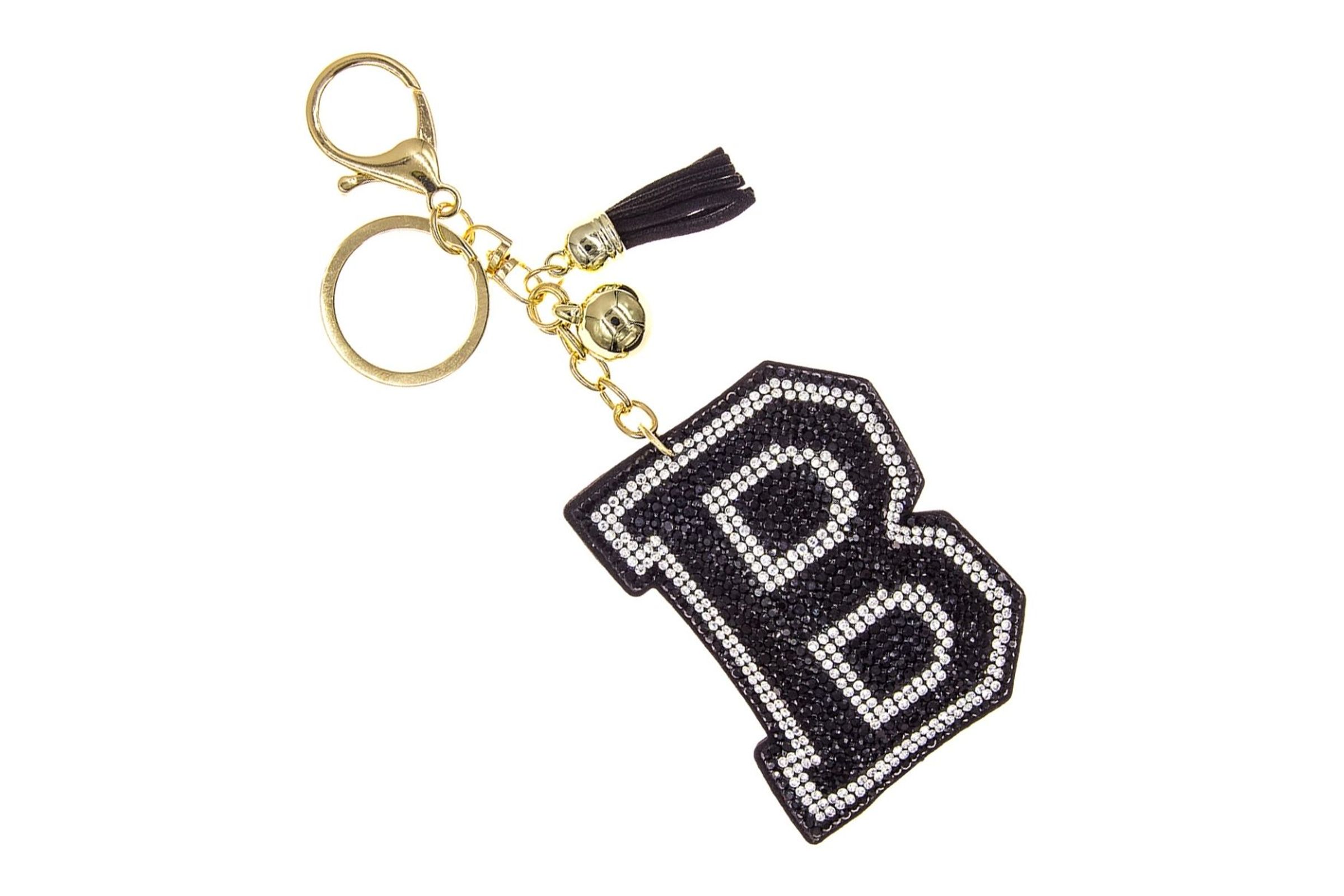 https://cdnimg.pinktownusa.com/tr:h-,w-,cm-pad_resize/media/catalog/product/image/72244678/b-black-keychain-bag-charm.jpeg?ik-sdk-version=php-1.2.2