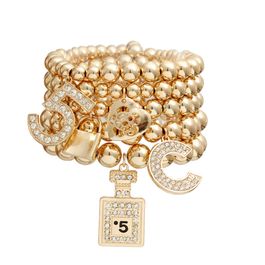 Shimmering Gold Boutique No. 5 Charm Bracelets
