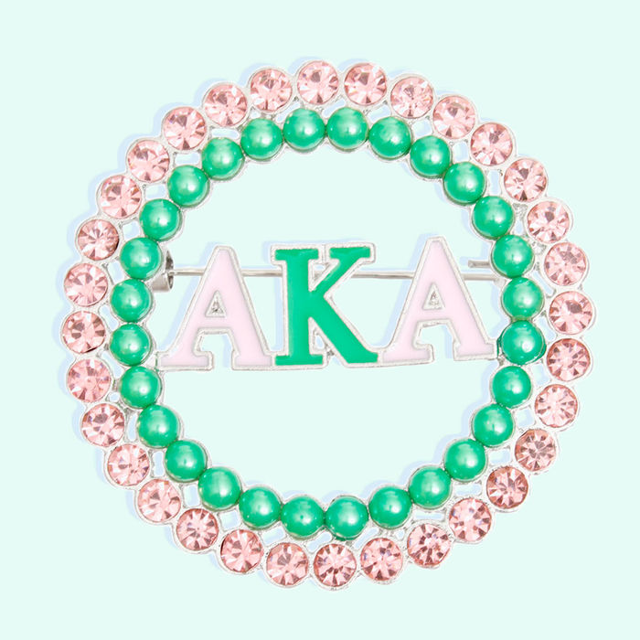 Pink and green brooch online