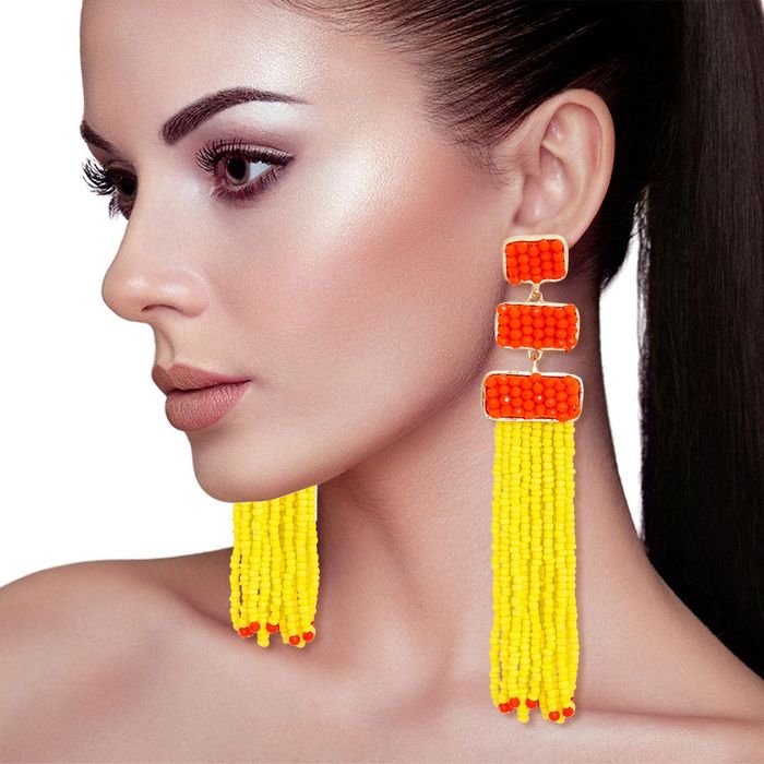 Yellow beaded outlet tassel earrings