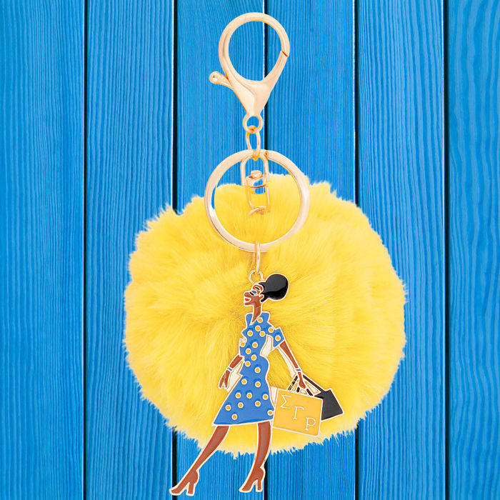 Yellow pom pom keychain store
