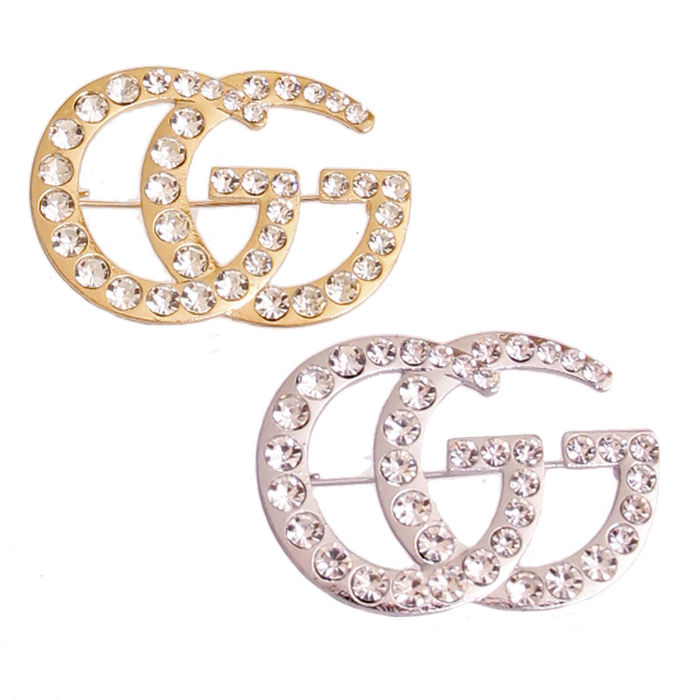 Dozen GG Rhinestone Brooches